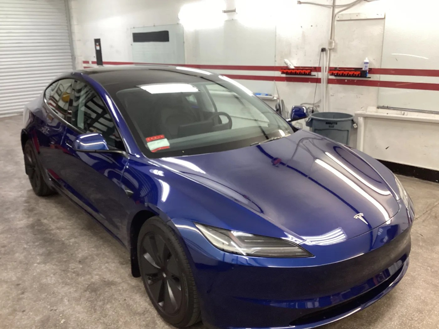 Blue Tesla sedan from Superior’s window tint photo collection in Ontario